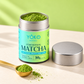 Open Yōko Matcha 30g ceremonial matcha tin with green powder, a deep plain silver lid and gold spoon