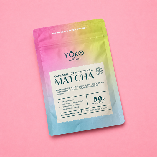 Yoko Matcha 50g organic ceremonial matcha pouch with rainbow gradient packaging, angled hero shot